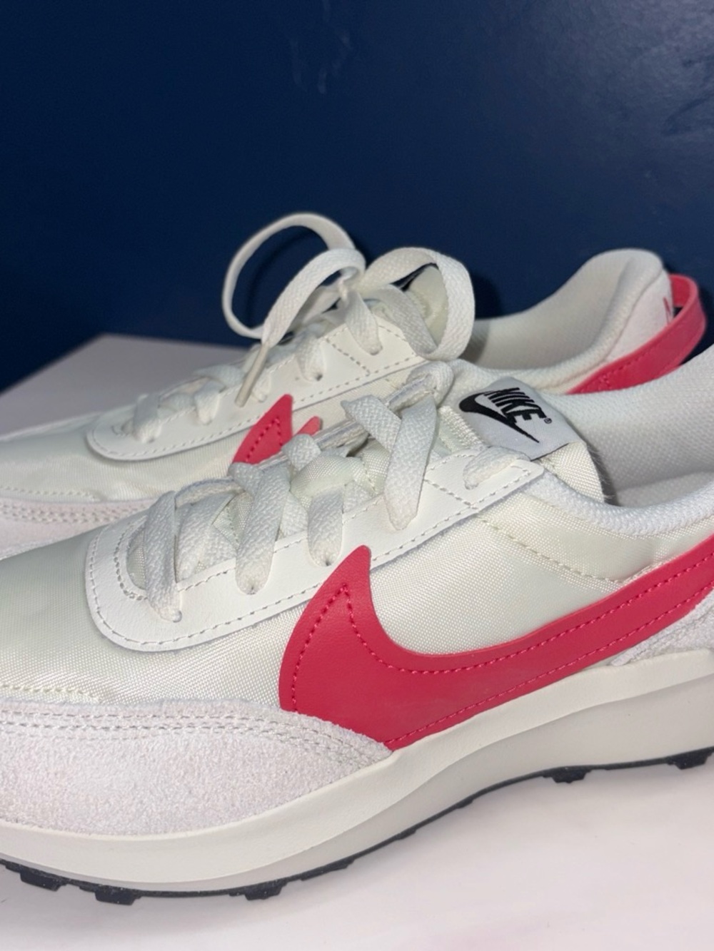 Nike Womens White Sneakers with Pink Swoosh Accent